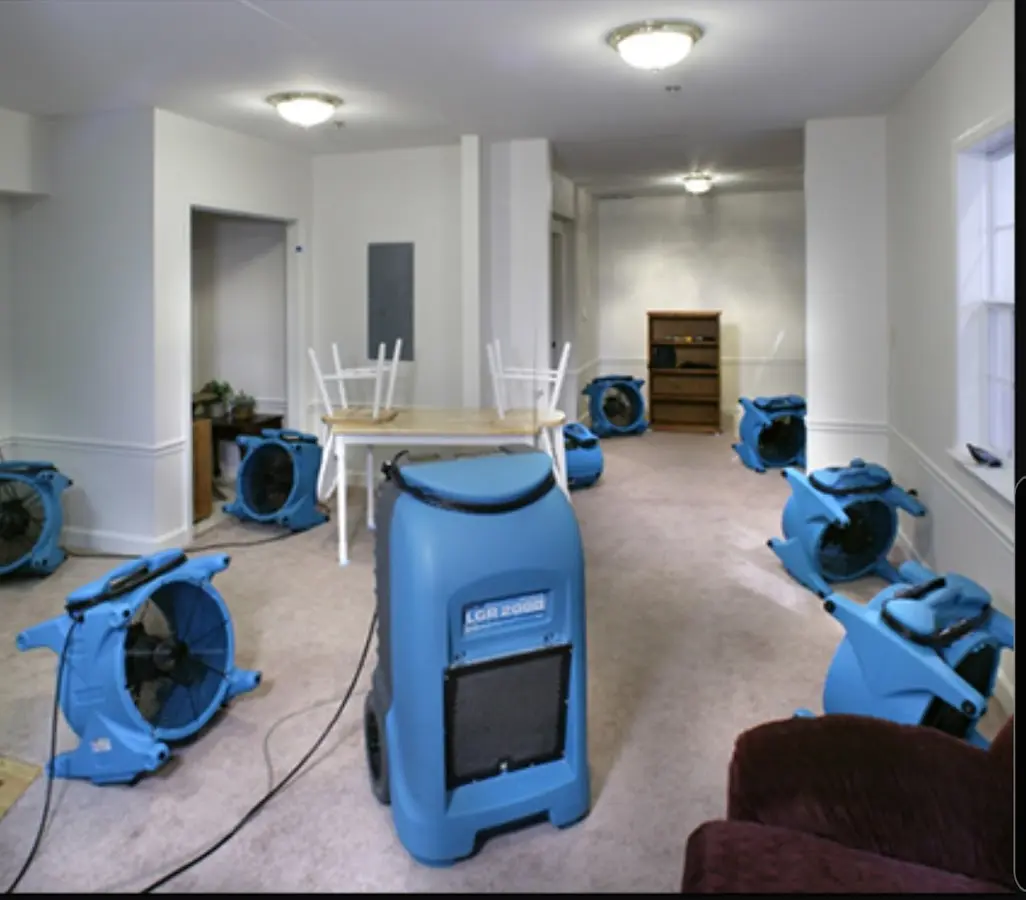 Air movers and dehumidifier setup for Water Extraction & Removal in Menominee